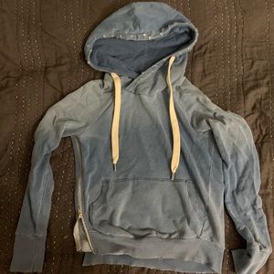 NSF distressed hooded sweatshirt.